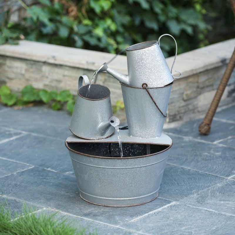 LuxenHome Farmhouse Rustic Metal Pitcher Outdoor Fountain Silver