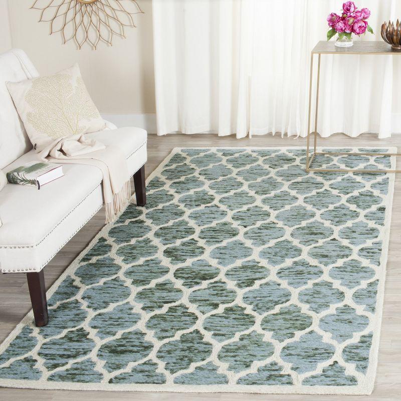Himalaya HIM121 Hand Loomed Area Rug - Turquoise/Ivory - 5'x8' - Safavieh.