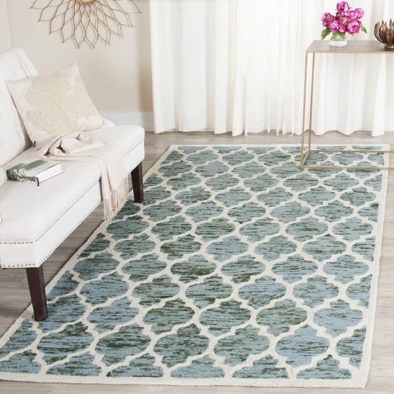 Turquoise and Ivory Hand-Knotted Wool Area Rug