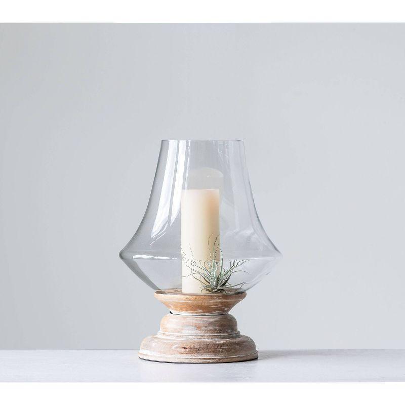 Storied Home 16" x 13" Glass Hurricane Candle Holder with Mango Wood Base Natural/Clear - Pillar Candle Compatibility, Tabletop Display