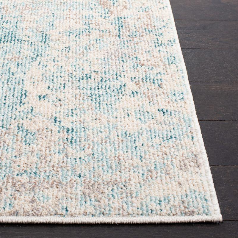 Ivory Synthetic 6' x 9' Hand-Knotted Easy Care Area Rug