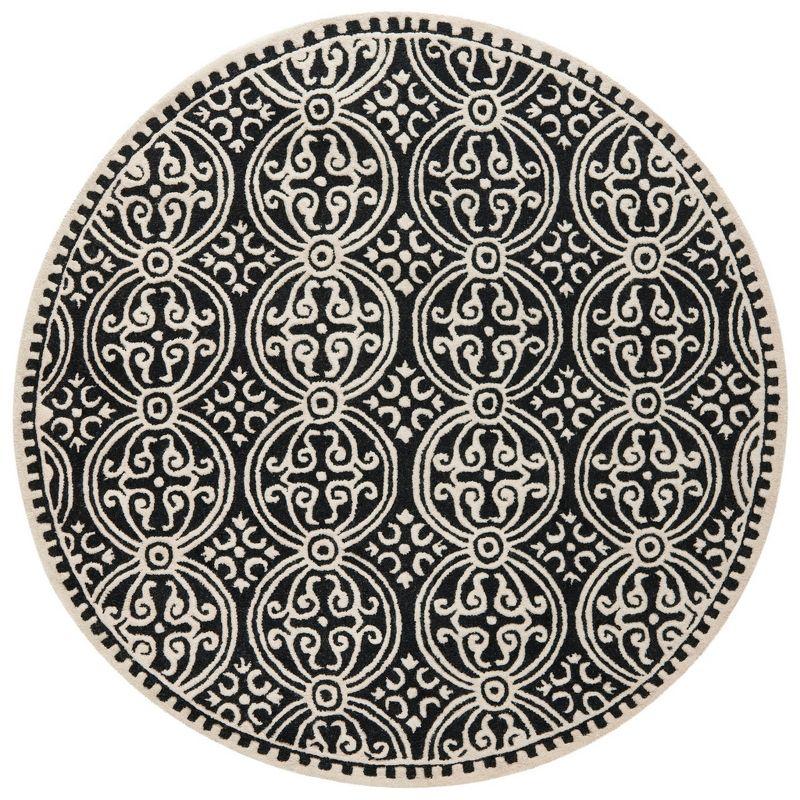 Cambridge CAM123 Hand Tufted Area Rug  - Safavieh