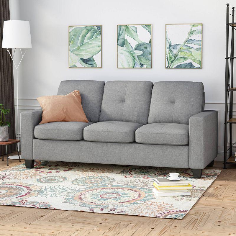 Contemporary Gray Tufted Sofa with Sloped Arm and Wood Legs