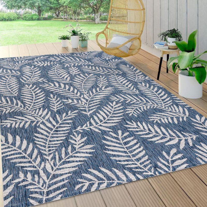 Ivory and Navy Palm Frond 4' x 6' Reversible Outdoor Rug