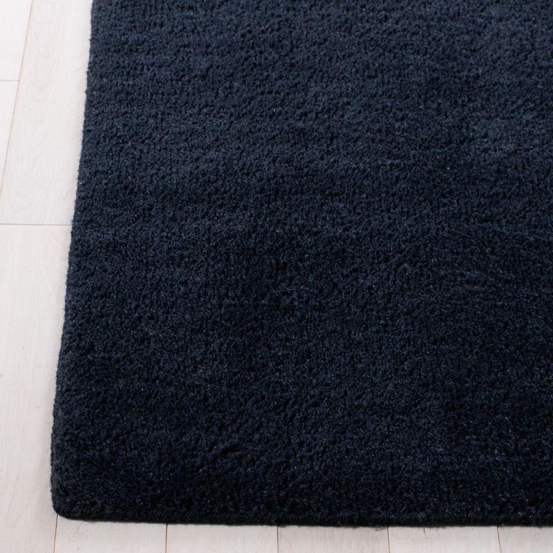 Elegant Tufted Handmade Square Black Wool Accent Rug