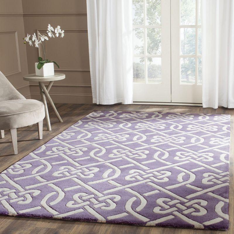 Ivory and Purple Hand-Tufted Wool 4' x 6' Area Rug