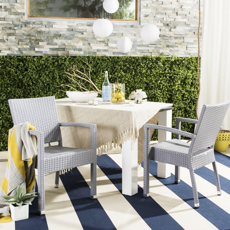 Kelda Stackable Arm Chair Indoor/Outdoor (Set Of 2) - PAT4004 - Grey - Safavieh