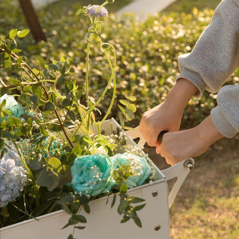 Elevated White Metal Mobile Planter Cart with Storage Shelf