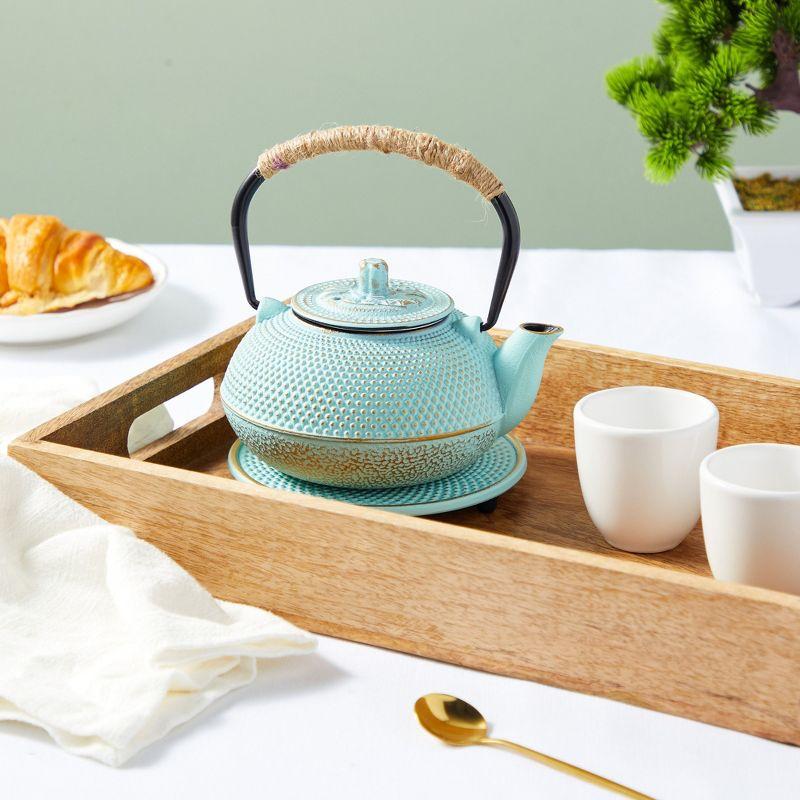 Pastel Green Cast Iron Japanese Teapot with Infuser and Trivet