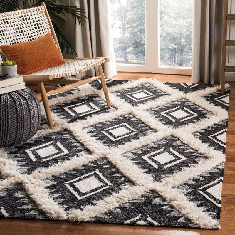 Handwoven Black and Ivory Wool Tribal Area Rug 6' x 9'