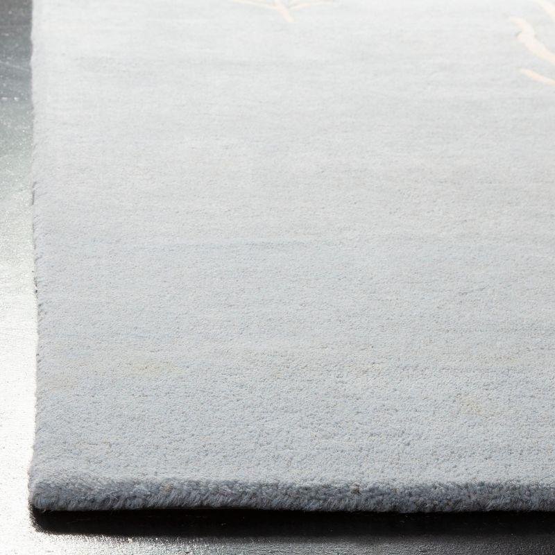 Soho SOH704 Hand Tufted Indoor Area Rug - Light Blue/Ivory - 5'x8' - Safavieh