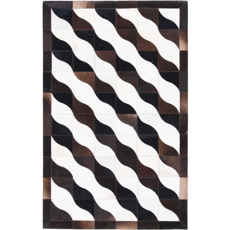 Handmade Black Geometric Cowhide Area Rug