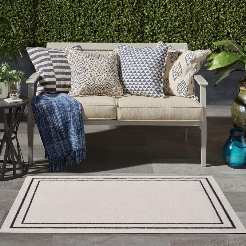 Nourison Essentials Bordered Indoor Outdoor Area Rug