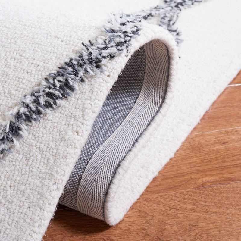 Casablanca CSB977 Hand Tufted Area Rug - Ivory/Black - 6'x9' - Safavieh.