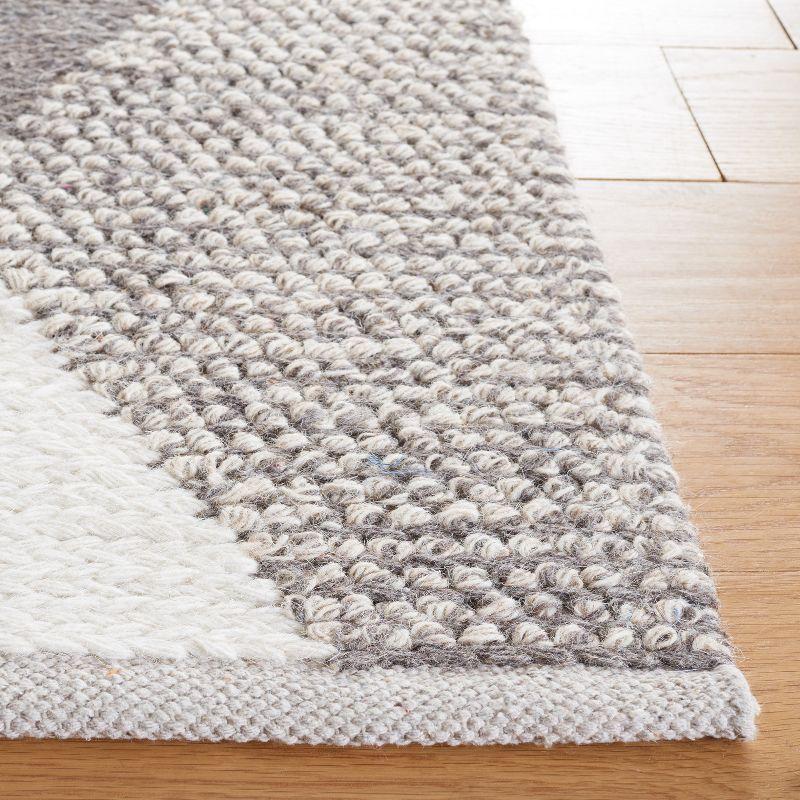 Ivory and Beige Hand-Woven Wool Area Rug - 3' x 5'