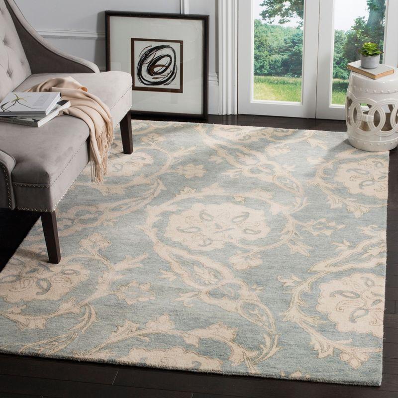 Roslyn ROS901 Hand Tufted Indoor Area Rug - 5'x8' - Light Blue/Ivory - Safavieh