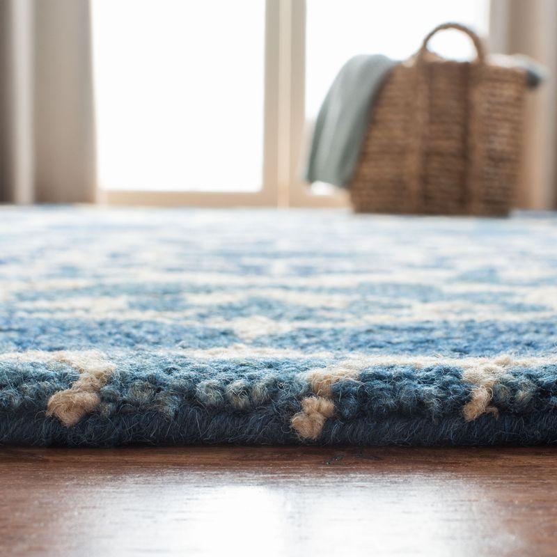 Handmade Blue and Ivory Wool Tufted 6' x 9' Rug