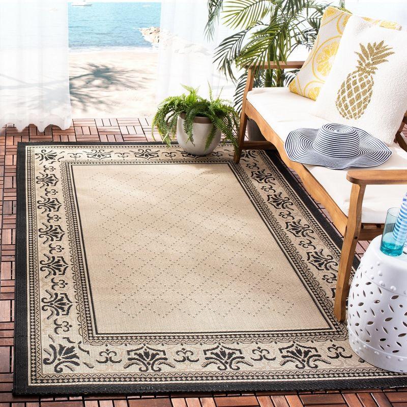 Sand and Black Synthetic Easy-Care Rectangular Area Rug, 4' x 5'7"