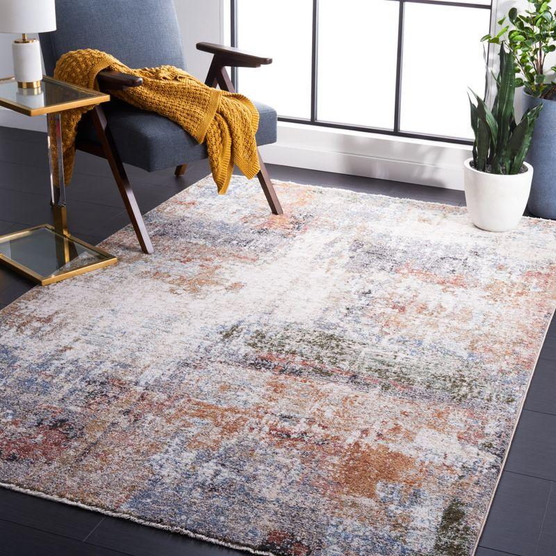 Jasmine Blue and Ivory Synthetic Area Rug