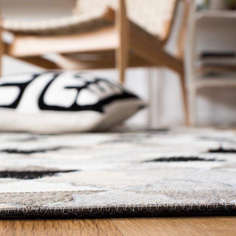 Loon Peak® Brentnal Flat Weave Hair On Leather Geometric Rug