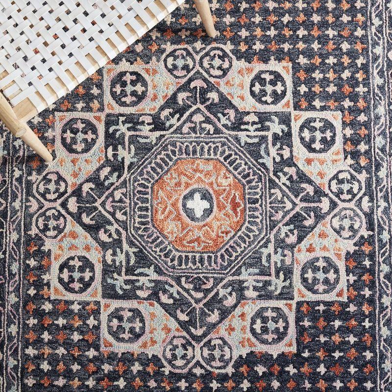 Aspen APN130 Hand Tufted Area Rug  - Black/Rust - 5'x5' - Safavieh.