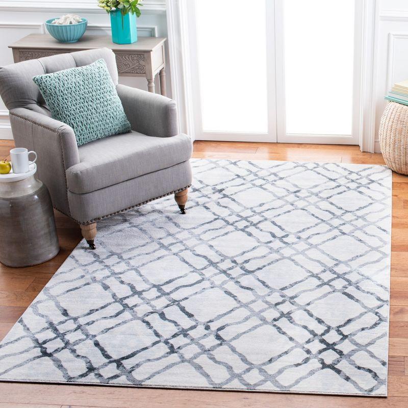 Ivory and Grey 4' x 6' Hand-Knotted Synthetic Area Rug