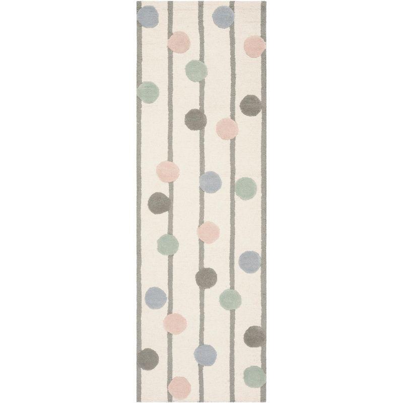 Safavieh Kids SFK909 Hand Tufted Area Rug  - Safavieh