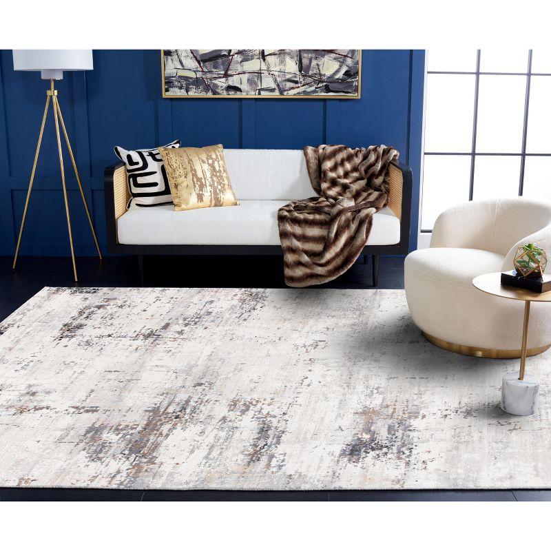 Ivory and Gray Abstract 8' x 10' Stain-Resistant Rug