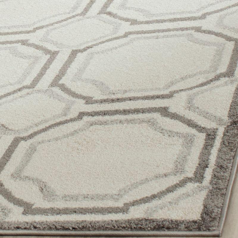 Ivory and Light Grey Geometric Synthetic Area Rug