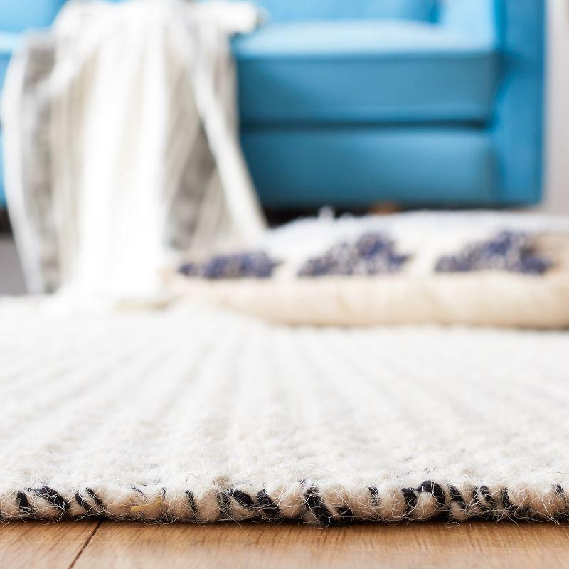 Ivory and Black Geometric Handwoven Wool Cotton Area Rug