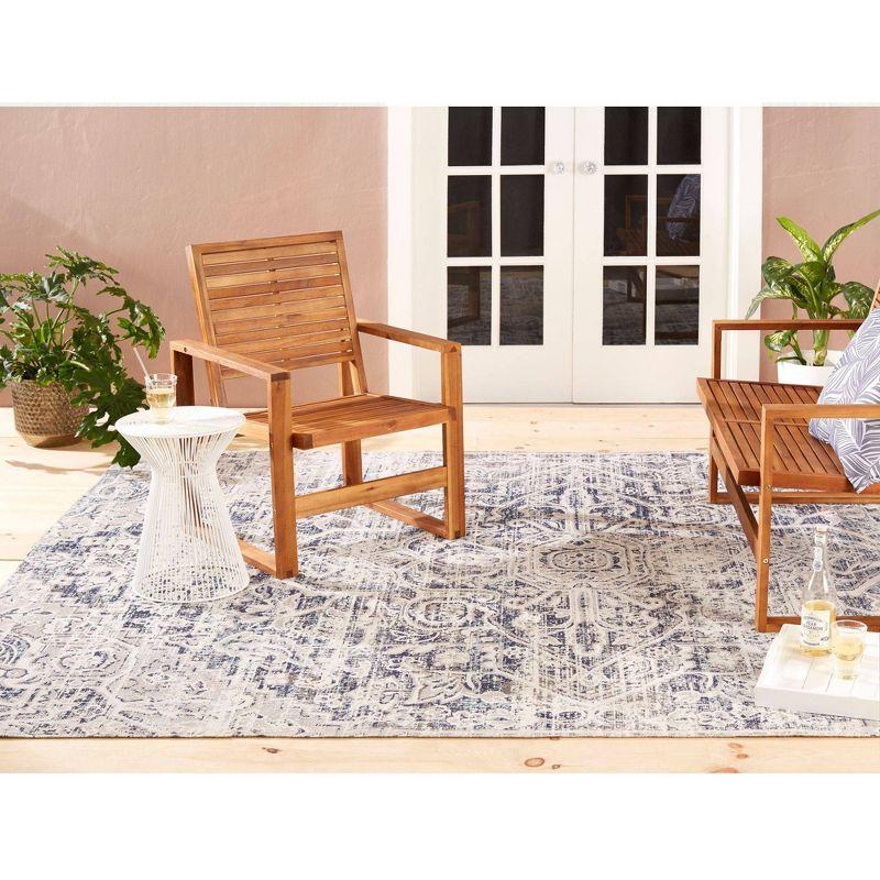 Sofia Fleur 5'3" x 7'2" Outdoor Patio Rug Navy Blue - Nicole Miller