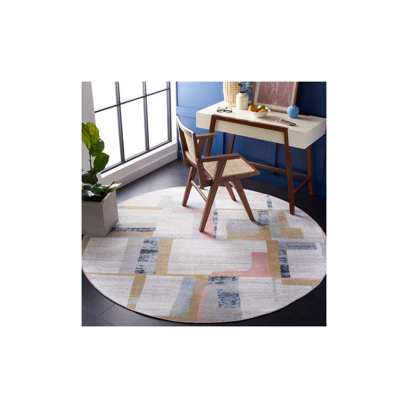 Ivory and Blue Rust Round Synthetic Area Rug, 6'7"