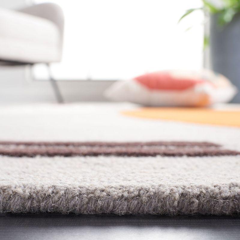 Hand-Tufted Rodeo Drive Grey and Rust Wool Area Rug