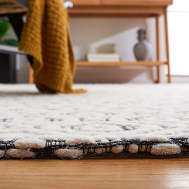 Marbella MRB325 Hand Woven Area Rug - Black/Ivory - 3'x5' - Safavieh.
