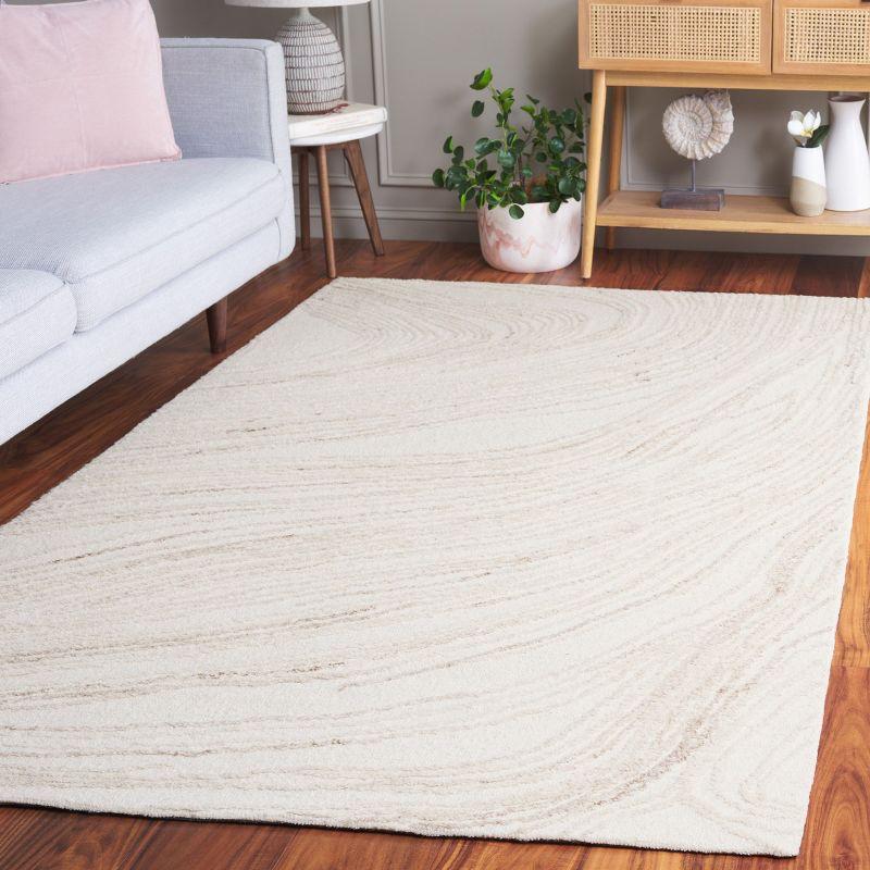 Ivory and Beige Hand-Tufted Wool Area Rug 6' x 9'