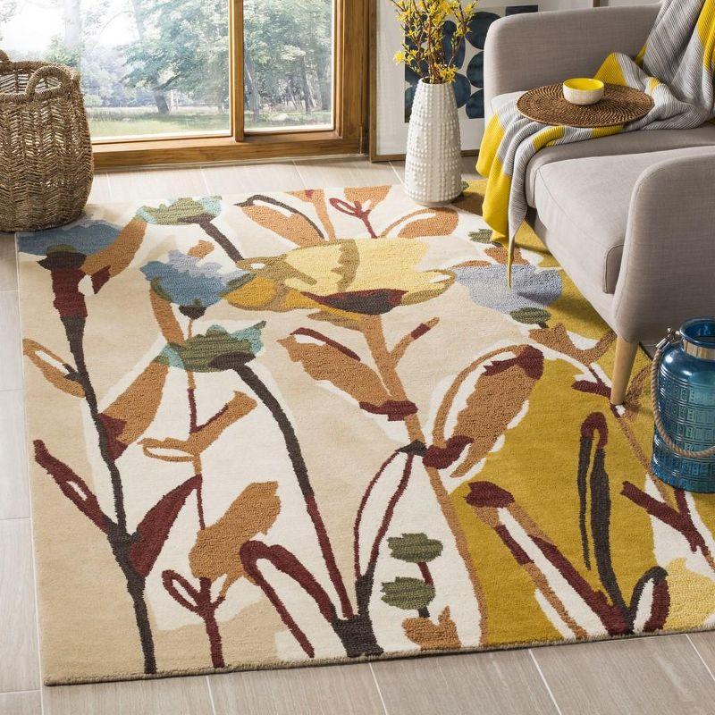 Ivory and Multicolor Floral Hand-Tufted Wool Area Rug, 4' x 6'