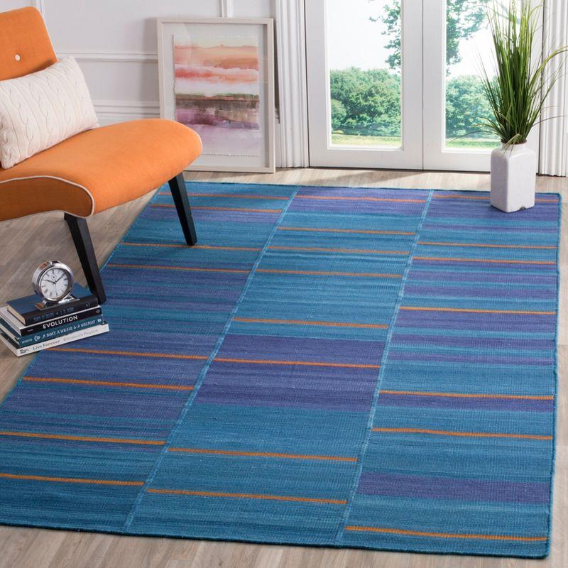 Blue and Multi 8' x 10' Handmade Wool Flat Weave Rug