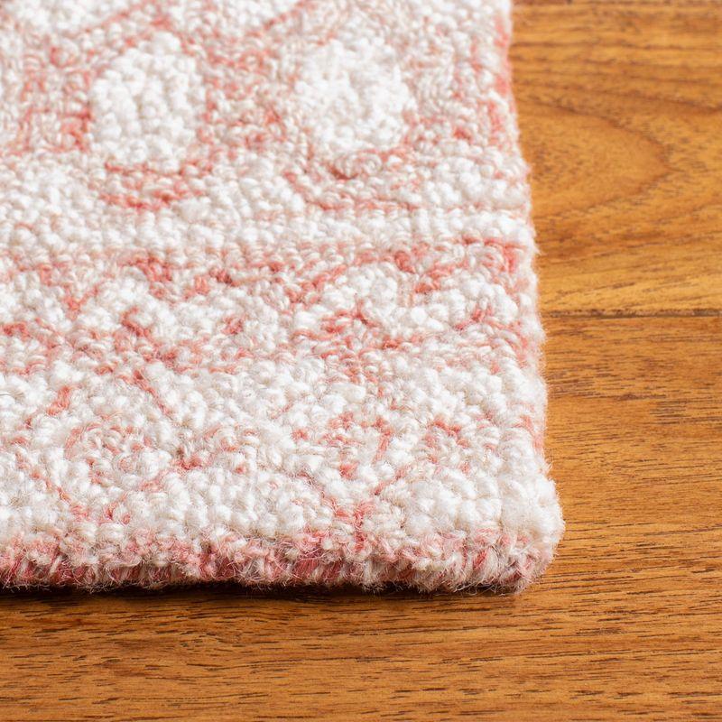 Handmade Pink and Ivory Tufted Wool Rectangular Rug