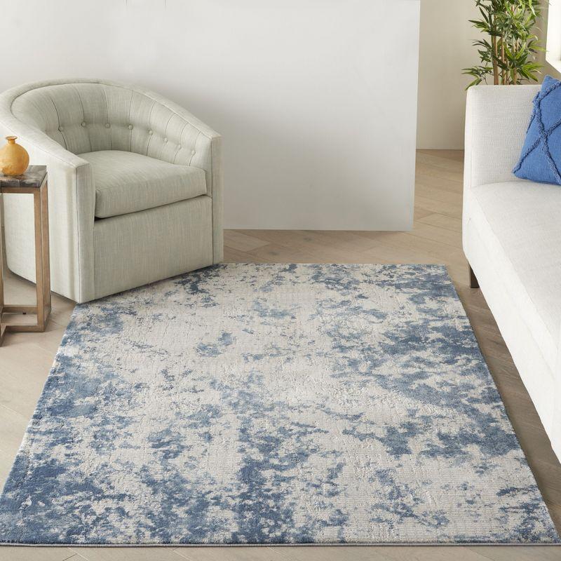 Gray and Blue Abstract 4' x 6' Synthetic Area Rug