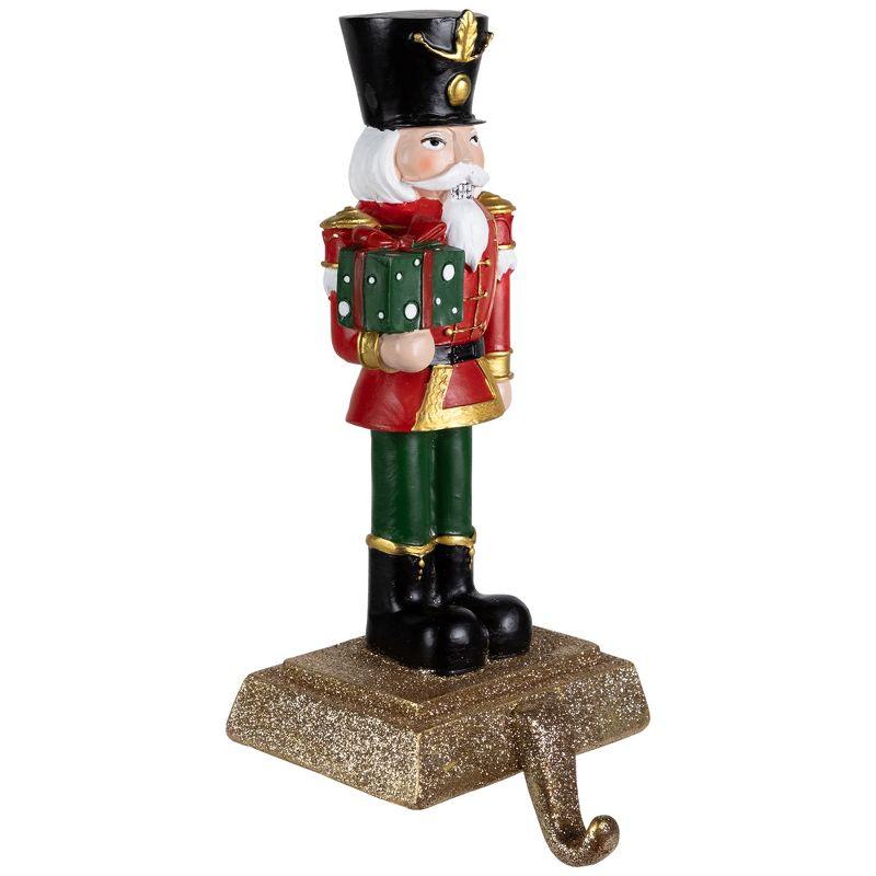 Northlight Glittered Nutcracker Soldier with Gift Christmas Stocking Holder - 9.5"