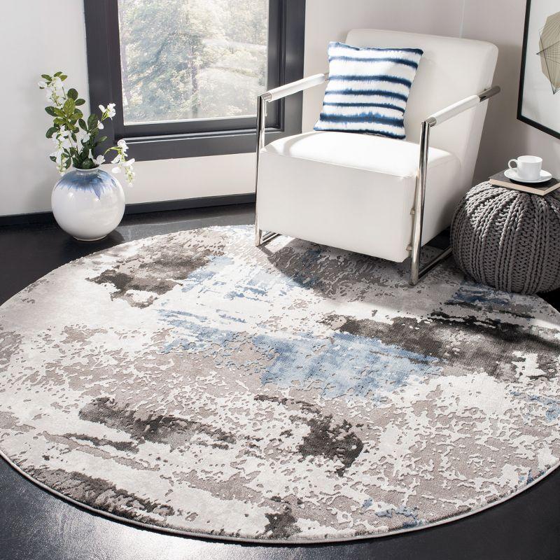 6'7" Round Gray Abstract Synthetic Area Rug