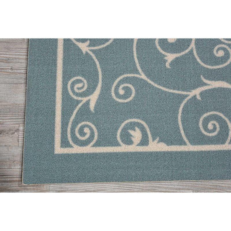 Light Blue Floral Synthetic Indoor/Outdoor Area Rug 4' x 6'