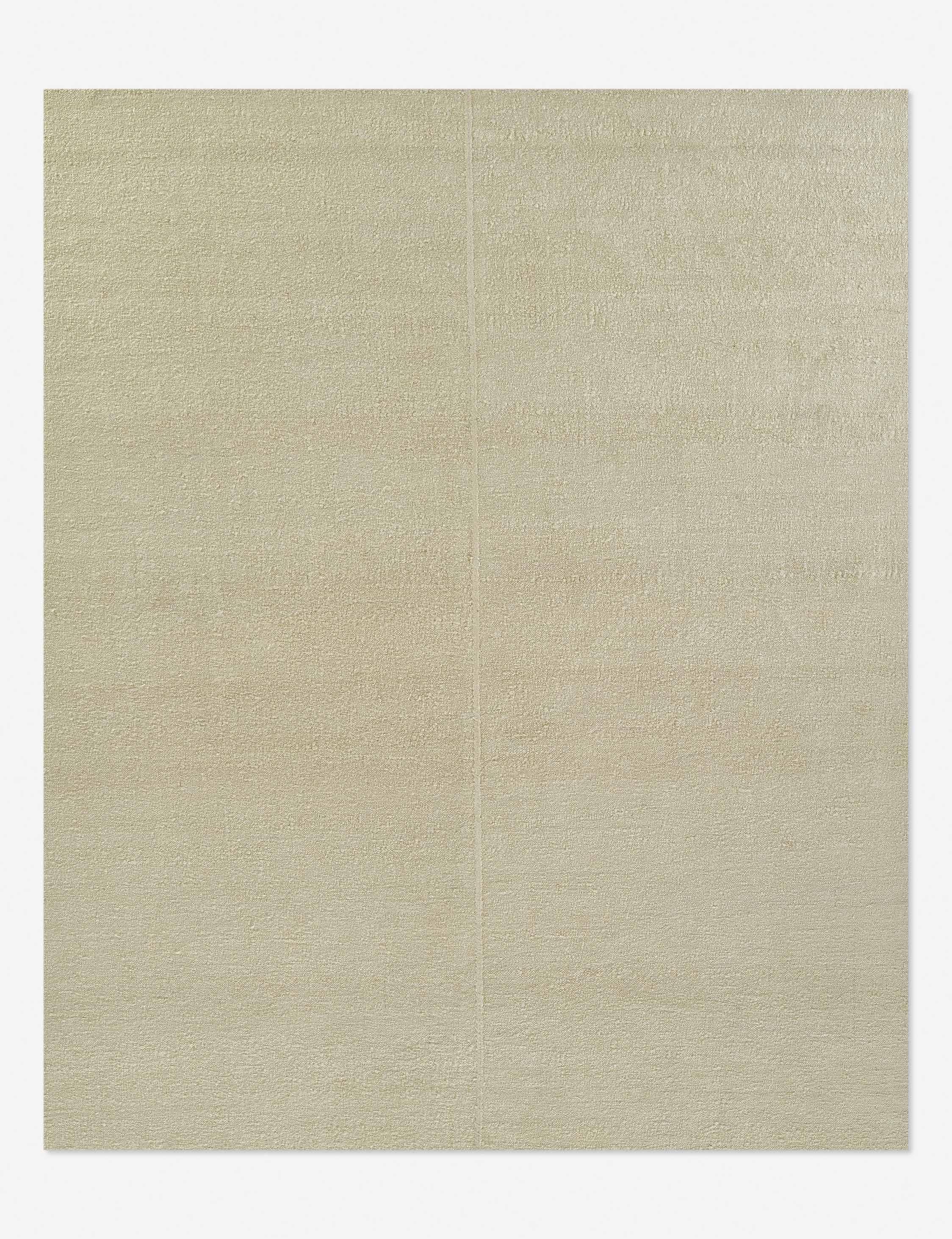 Koukila Ivory Solid Handwoven Wool 6' x 9' Area Rug