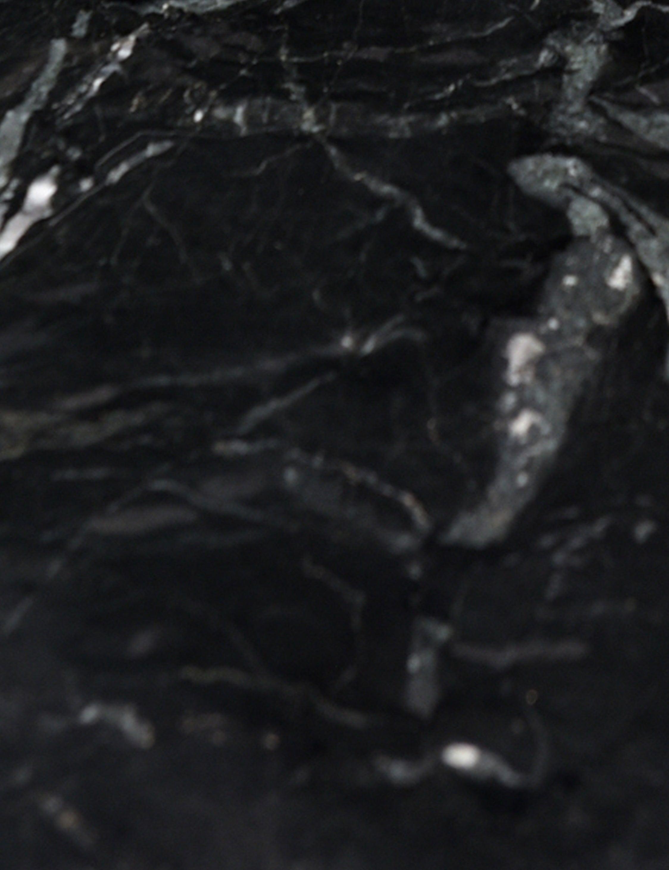 Huitink Round Dining Table - Black Marble