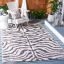 Ivory and Black Animal Print Indoor/Outdoor Rug