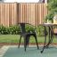 Sleek Black Steel Stackable Indoor-Outdoor Dining Armchair