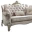 Ivory Tufted Leather Loveseat with Nailhead Trim and Round Arms