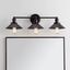 Elegant July Oil-Rubbed Bronze 3-Light Vanity Sconce with Clear Shade