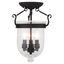 Jefferson Seeded Glass 3-Light Indoor/Outdoor Flush Mount in Black