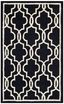 Hand-Tufted Black and Ivory Wool Geometric Rug, 2'6" x 4'